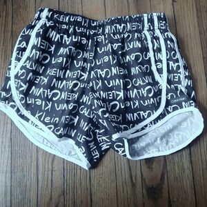 Calvin Klein - Women's Black/White Logo Stretch Lined Running Shorts. Size XS